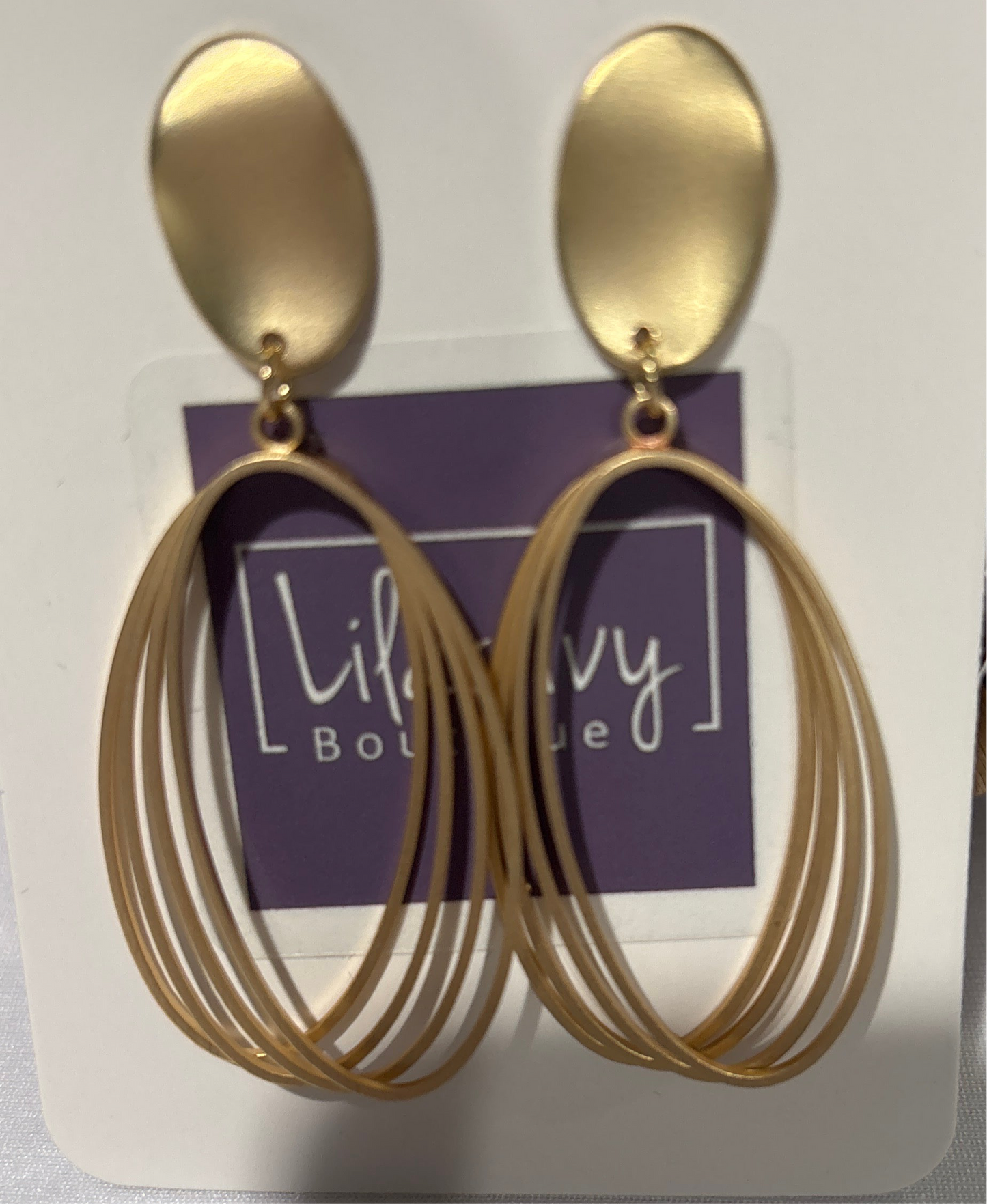 Gold oval wire earrings