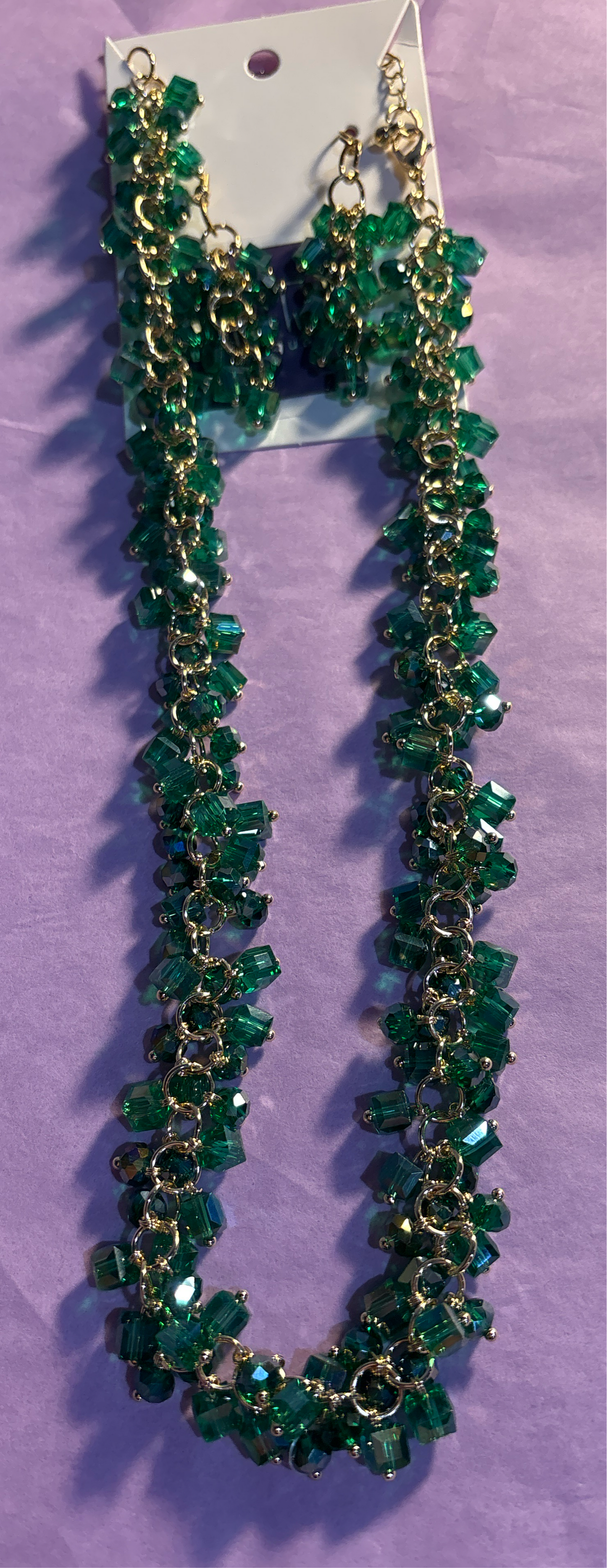 Green stone and gold necklace and earrings
