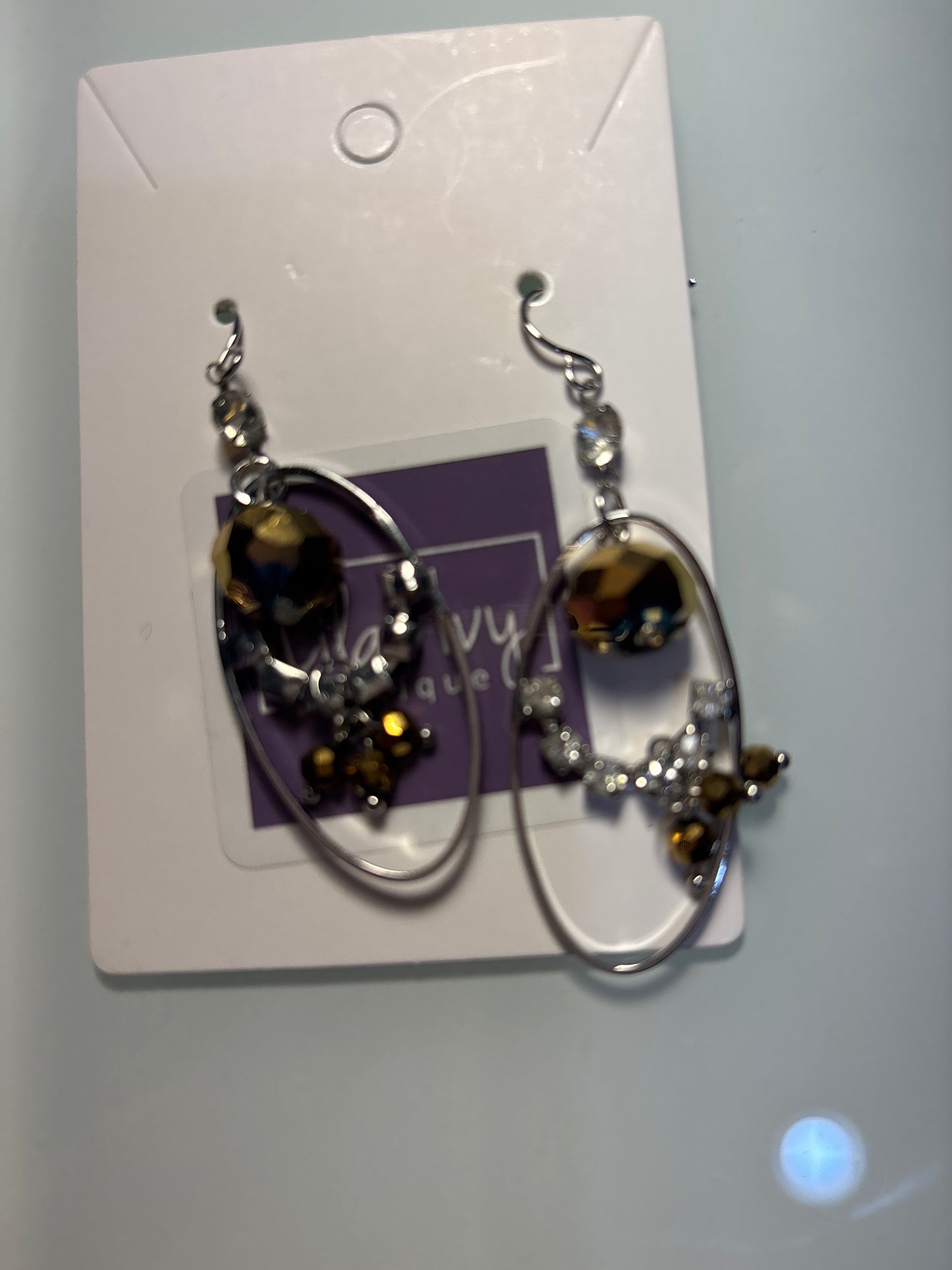 Silver oval with rhinestone and Amber stones