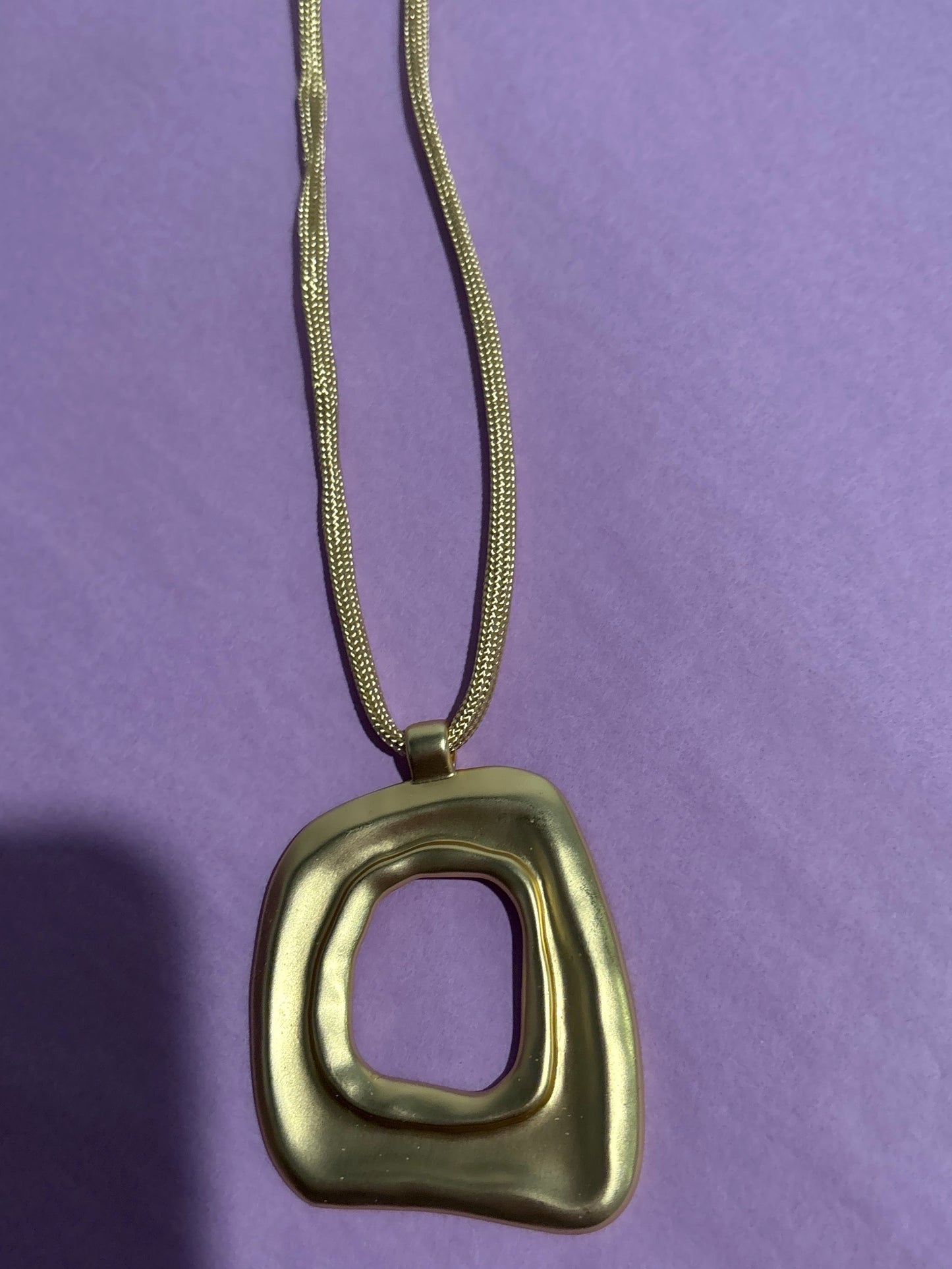 Brushed gold square pendant with center hole