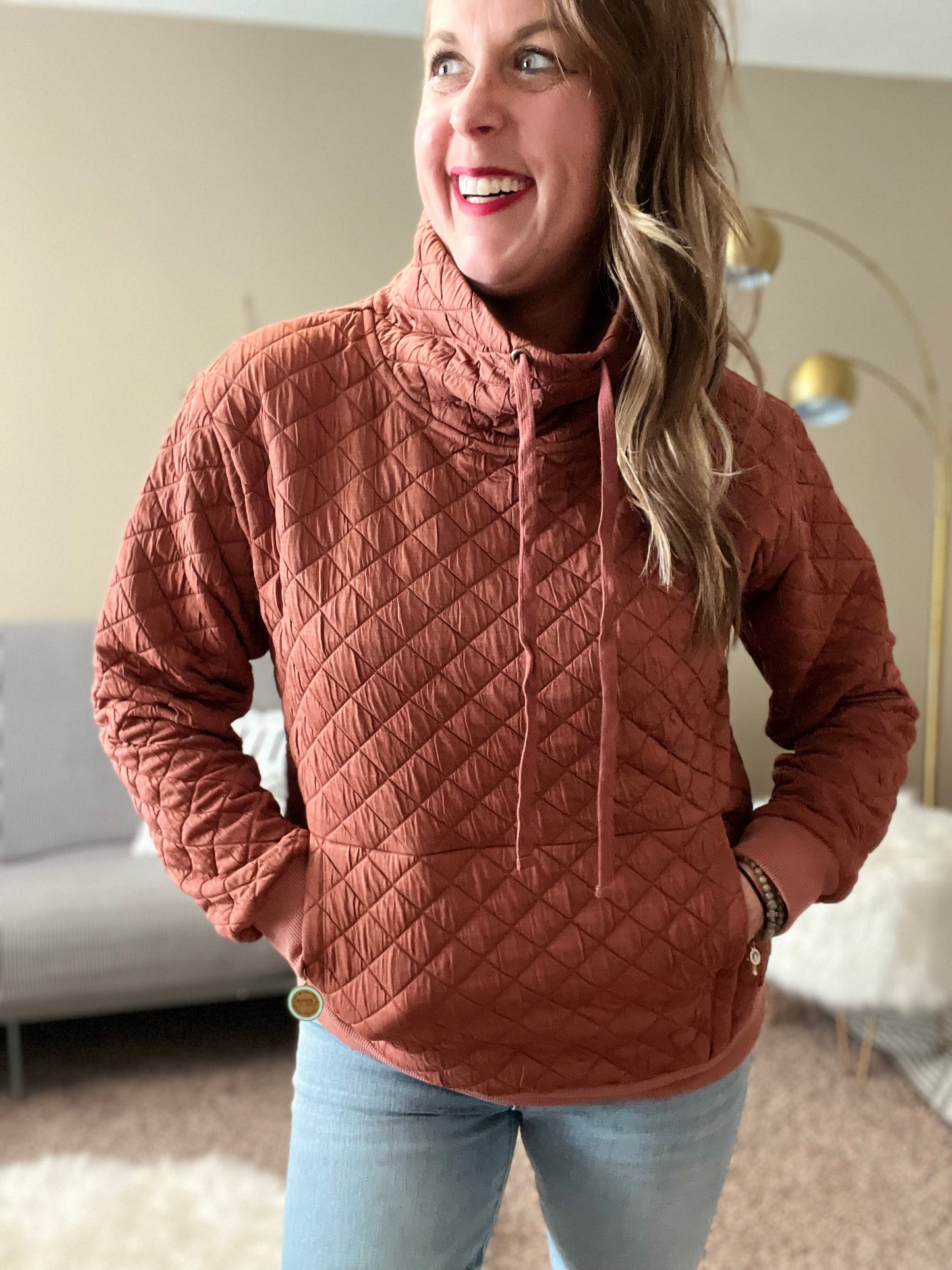 Funnel neck quilted pull over rust