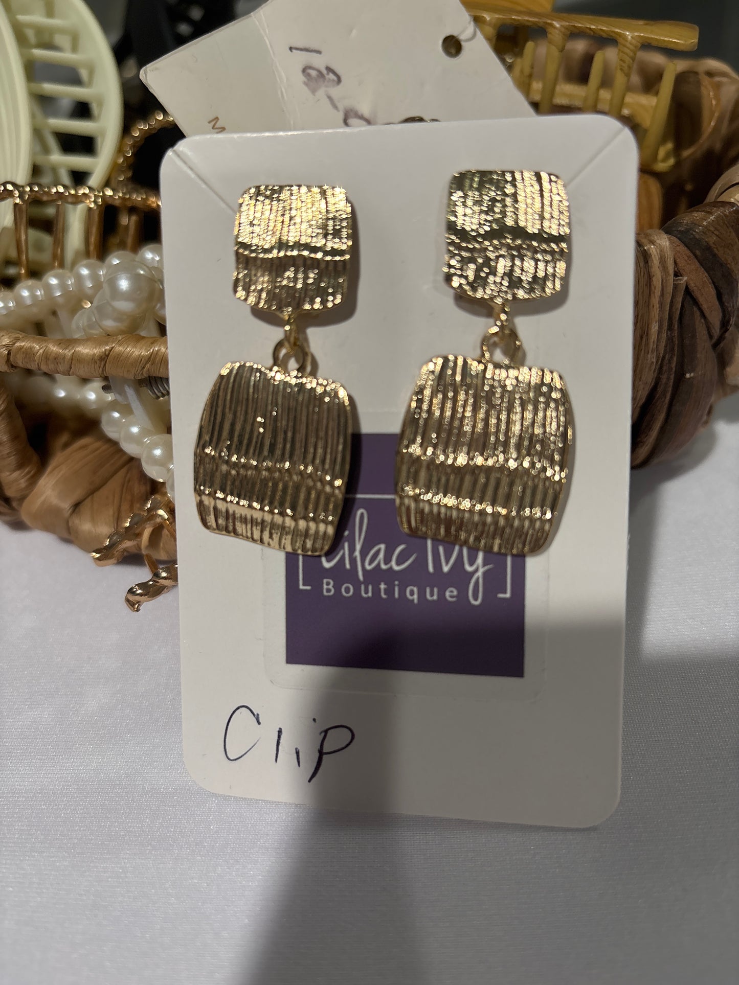 Gold textured clip earrings