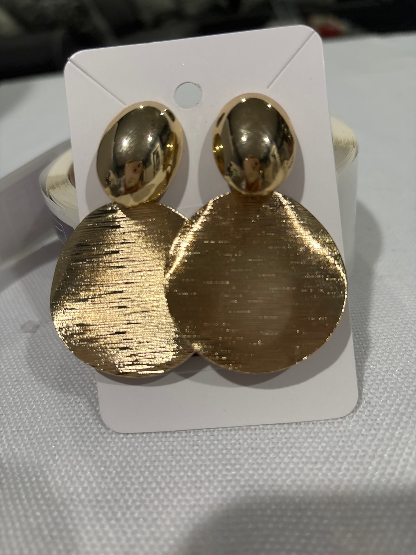 Gold disc drop earrings