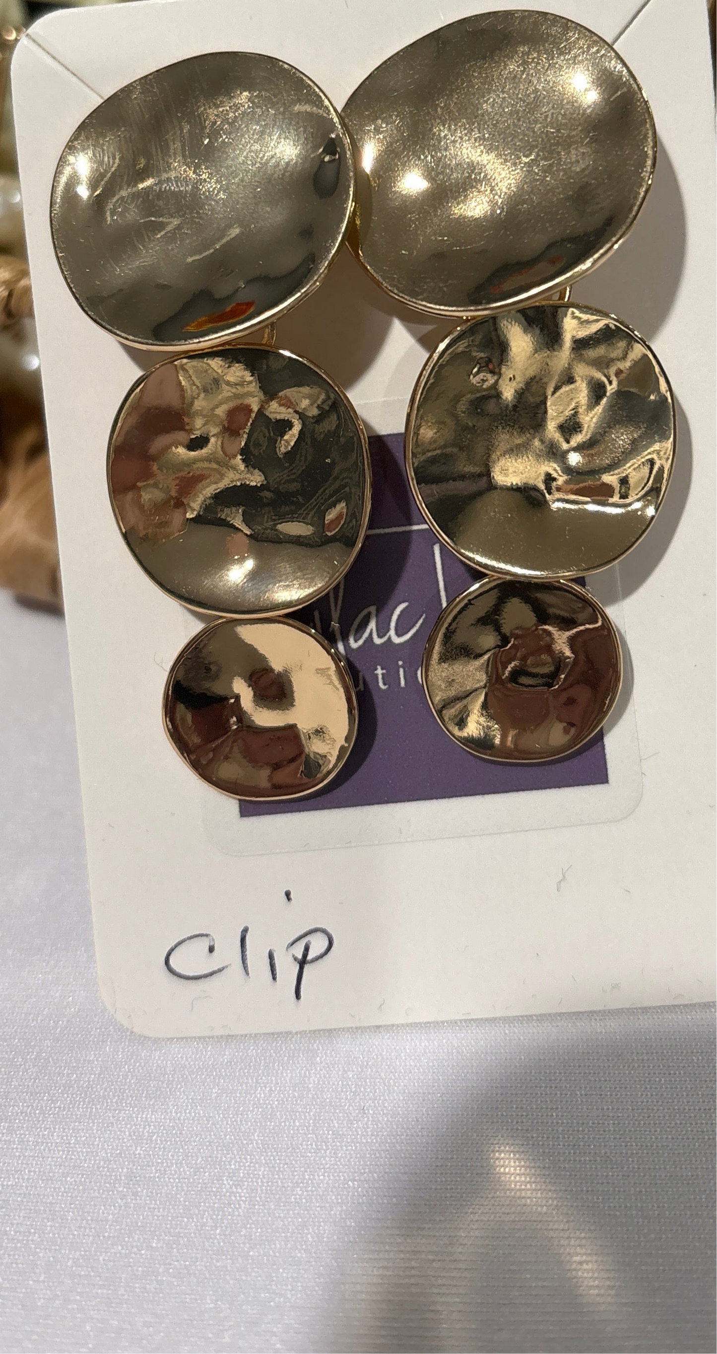 Three circle gold clip earrings