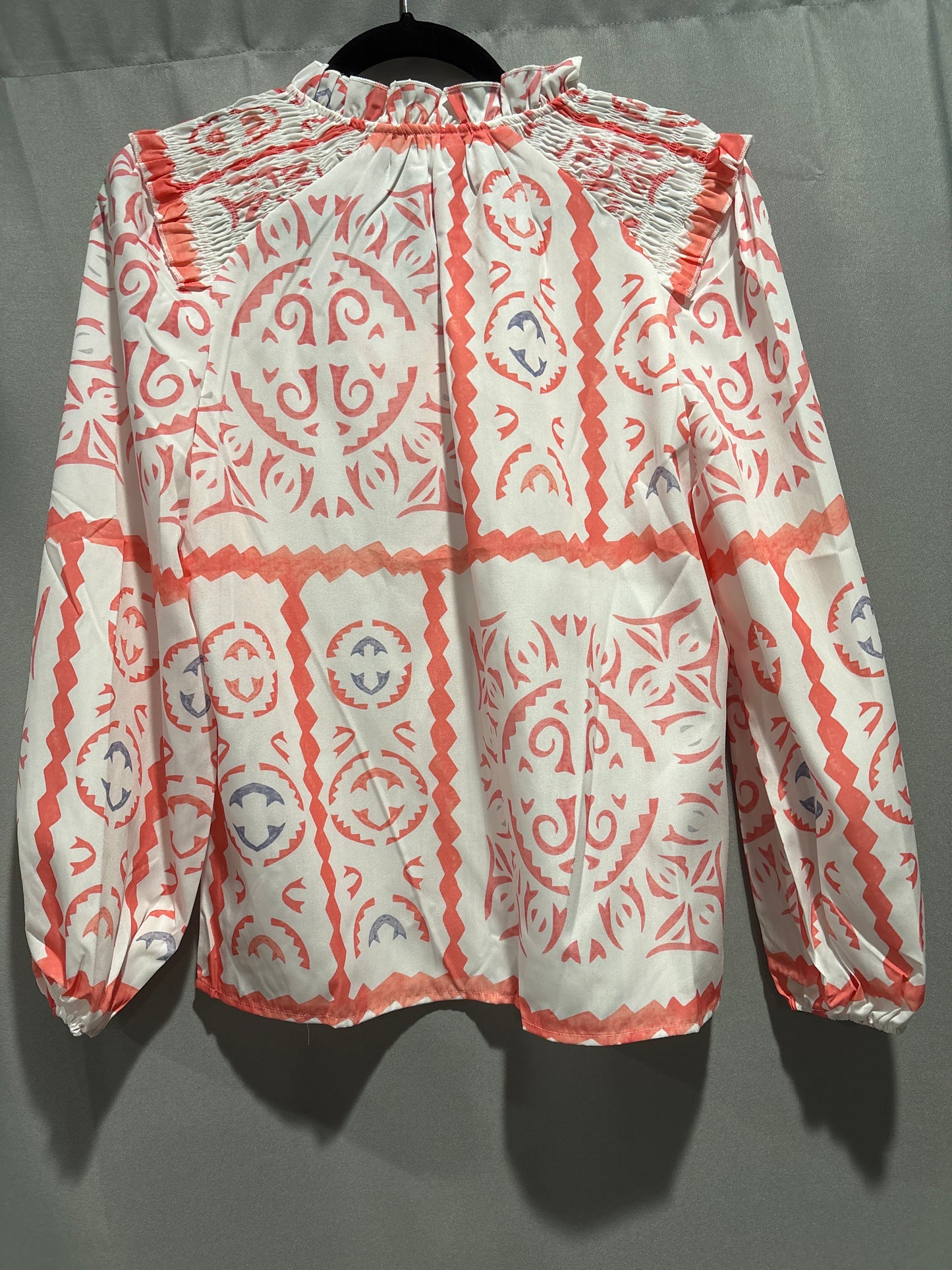 Print v-neck smocked long sleeve blouse