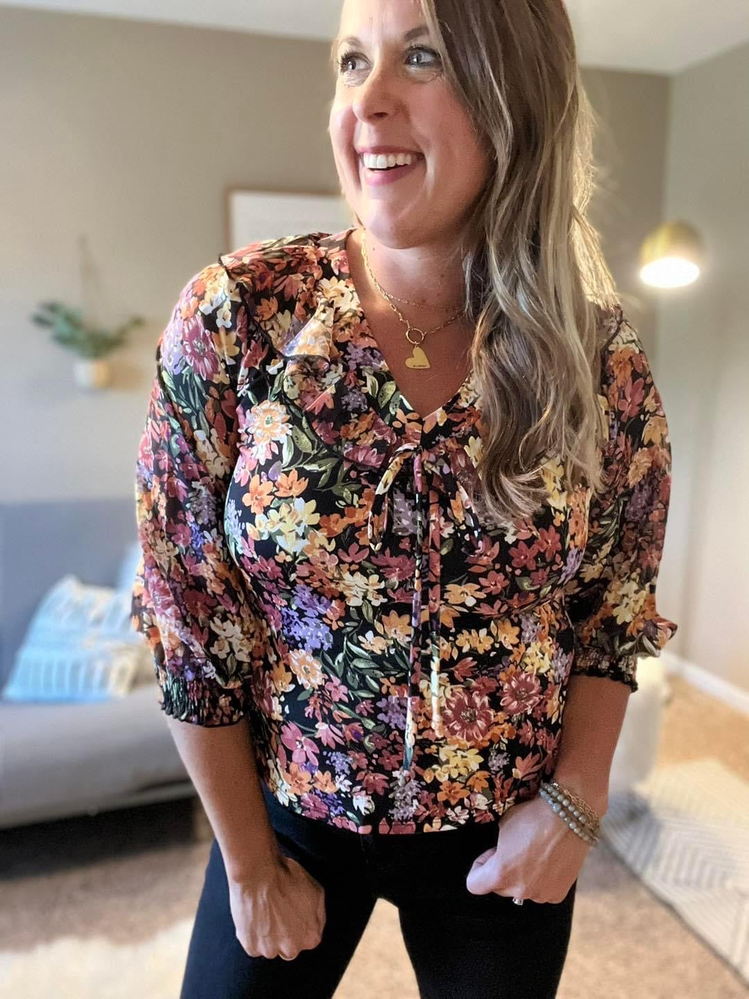 Printed ruffle tie neck blouse