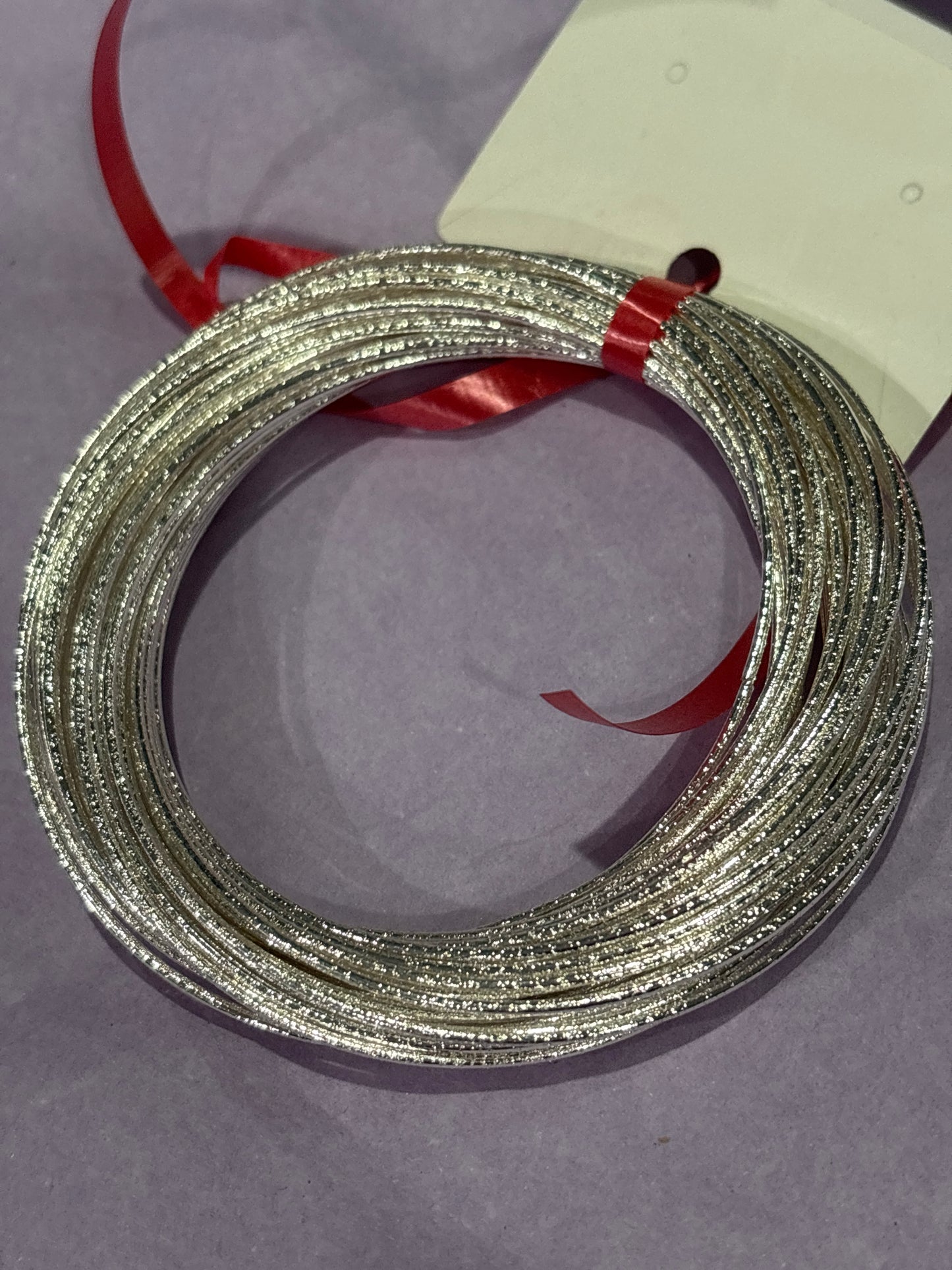 Multi strand, silver bangle bracelets