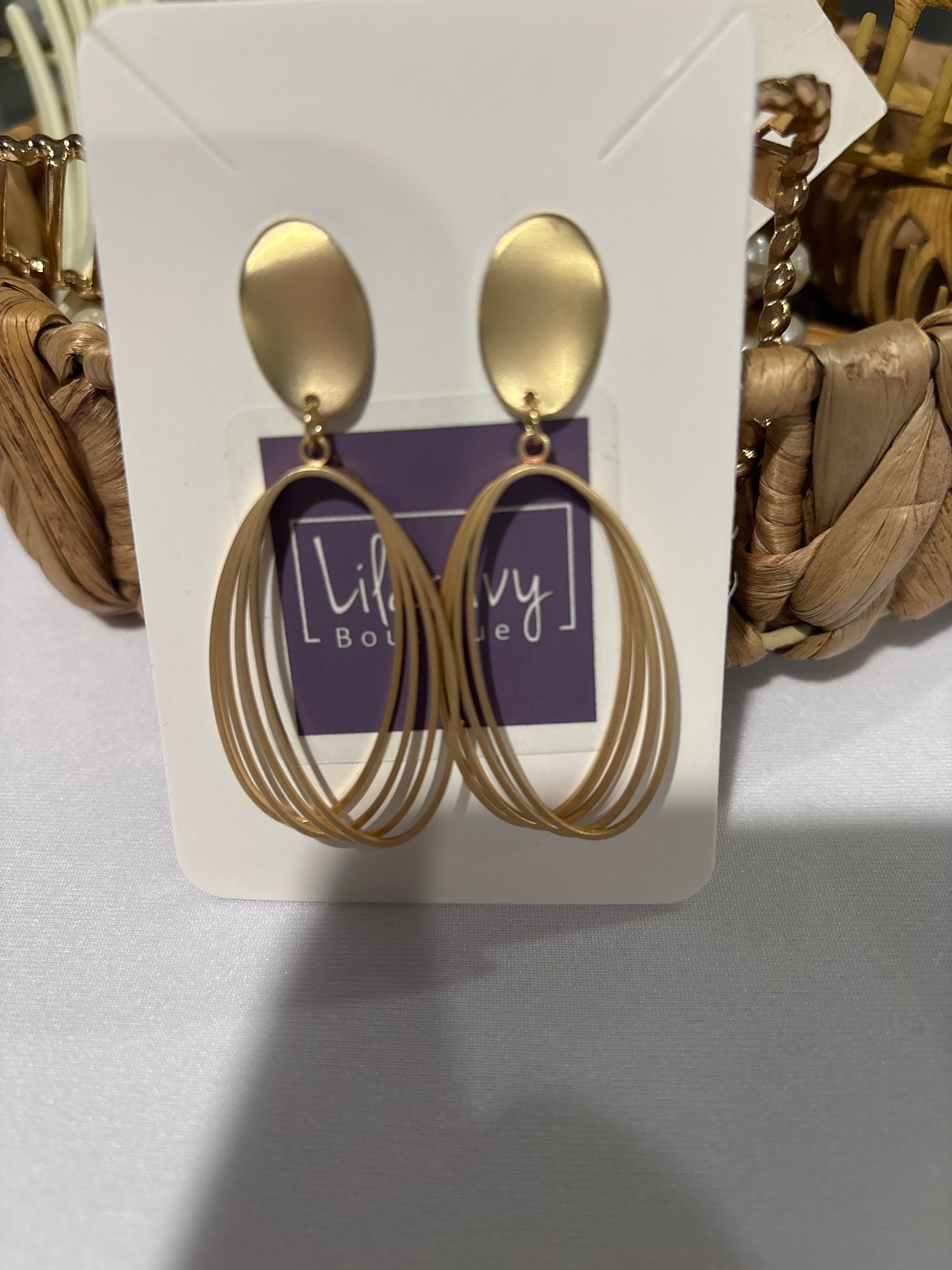 Gold oval wire earrings