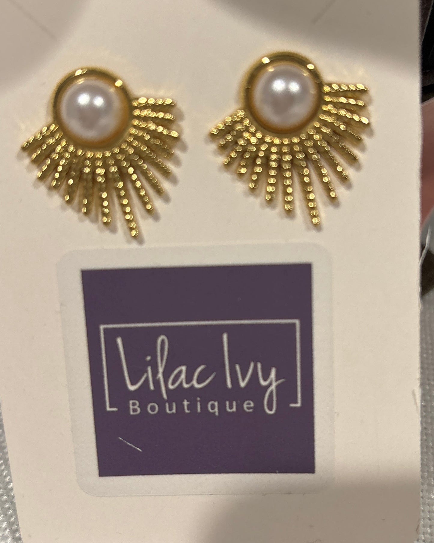 Gold and pearl sunburst earrings