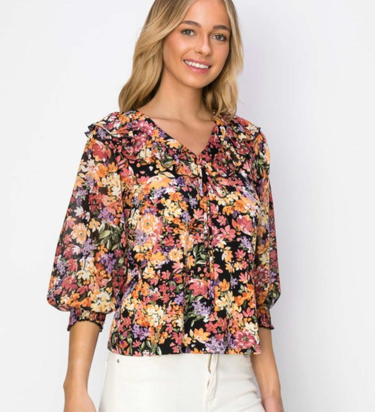 Printed ruffle tie neck blouse