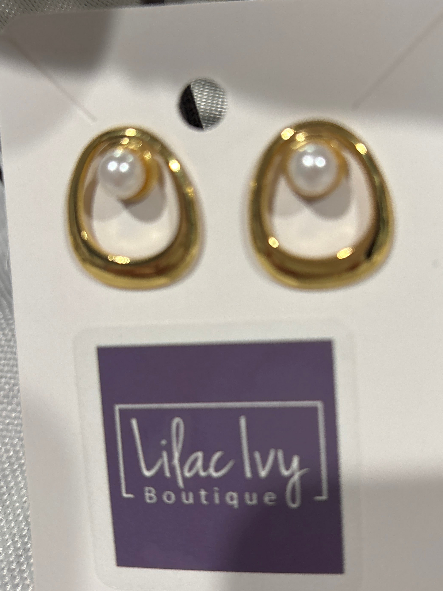 Gold square with pearl center