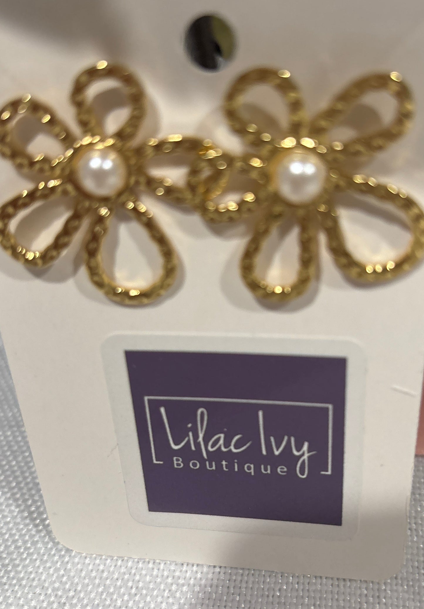 Gold flower with pearl center earrings