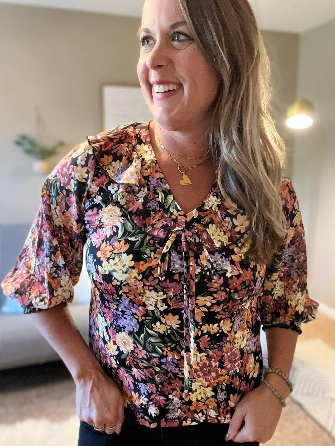 Printed ruffle tie neck blouse