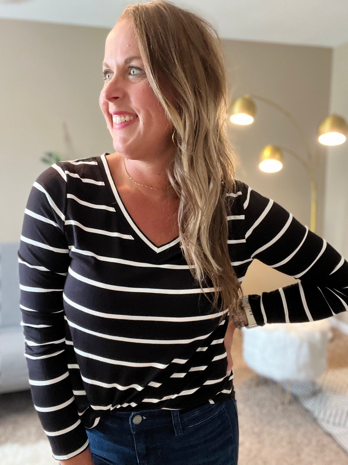 Striped v-neck dolphin hem top
