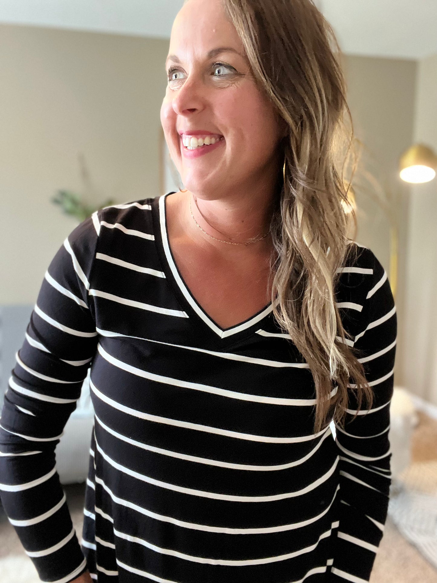 Striped v-neck dolphin hem top