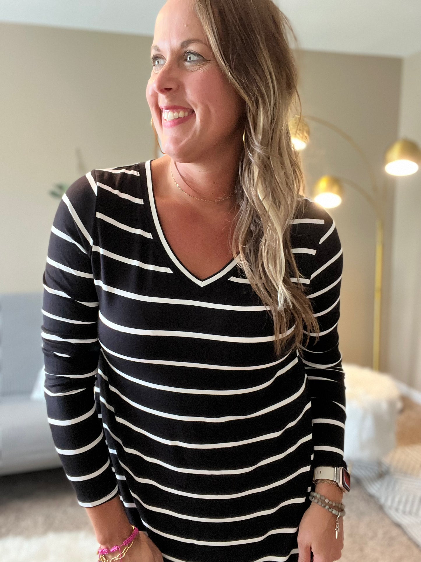 Striped v-neck dolphin hem top