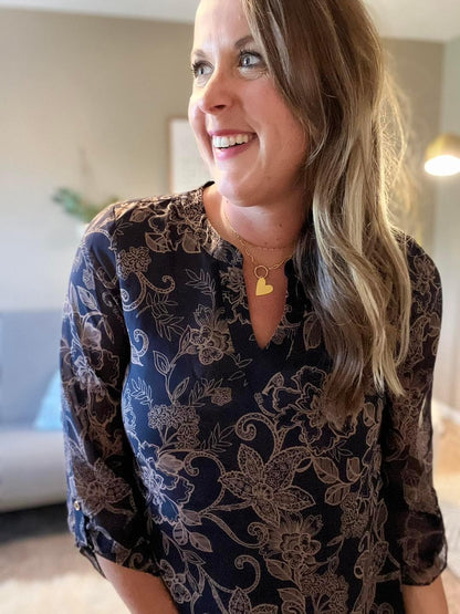 Printed asymmetrical hem blouse