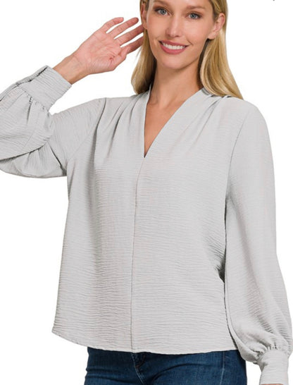 Woven V-neck long sleeve top