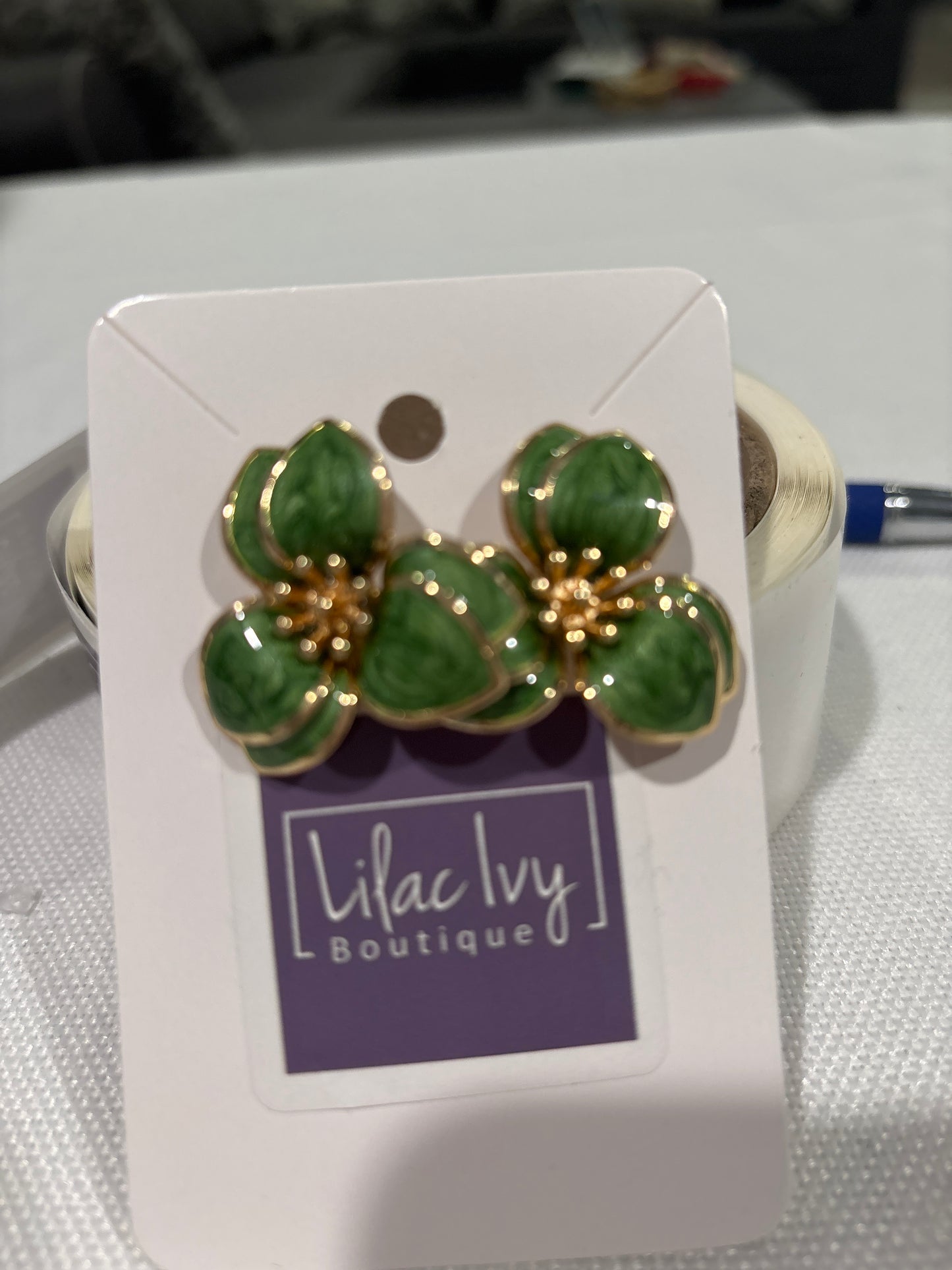 Green enamel flower earrings