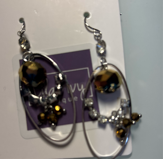 Silver oval with rhinestone and Amber stones
