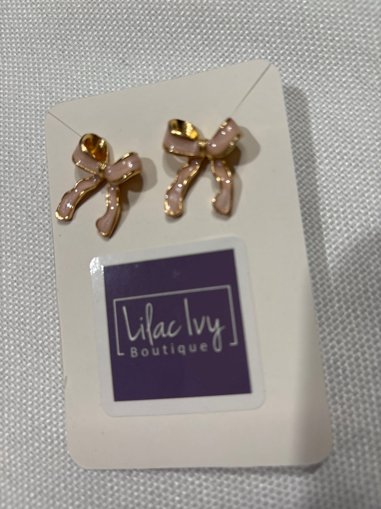 Pink and gold enamel bow earrings