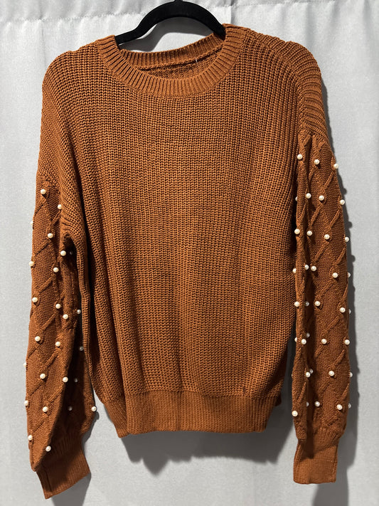 Knit sweater with pearl embellished sleeves