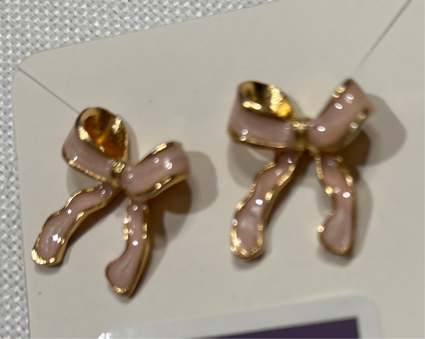 Pink and gold enamel bow earrings