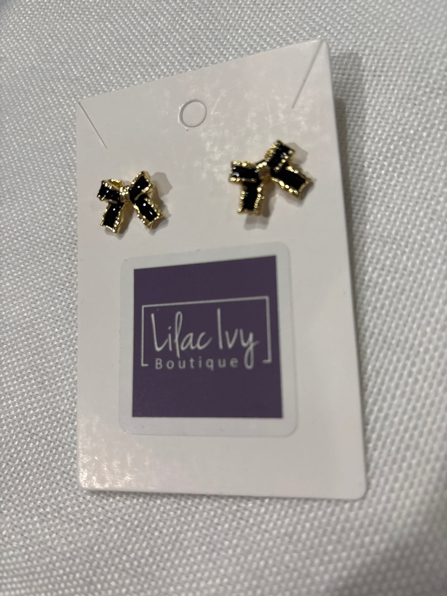 Black enamel bow earrings