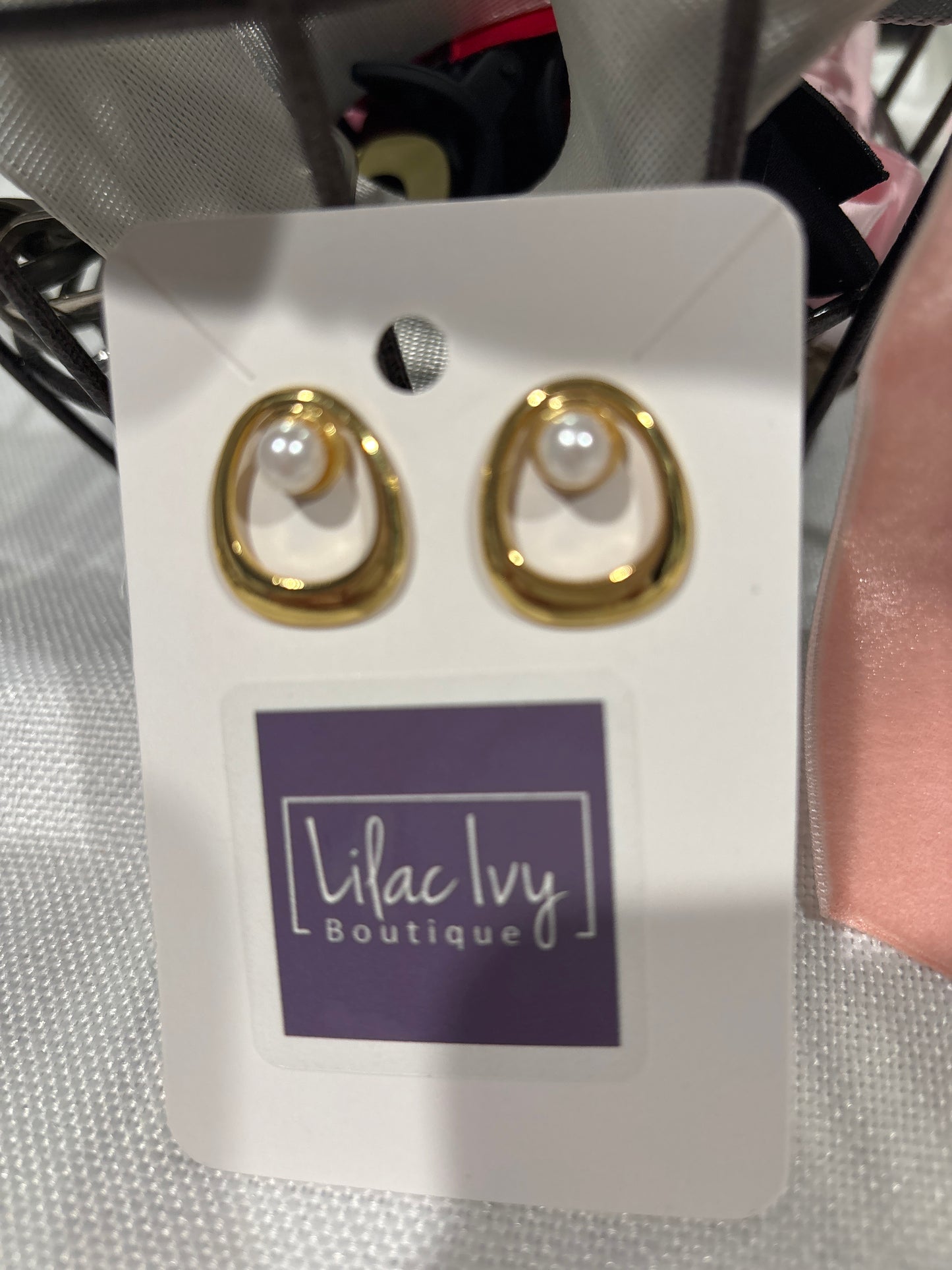 Gold square with pearl center