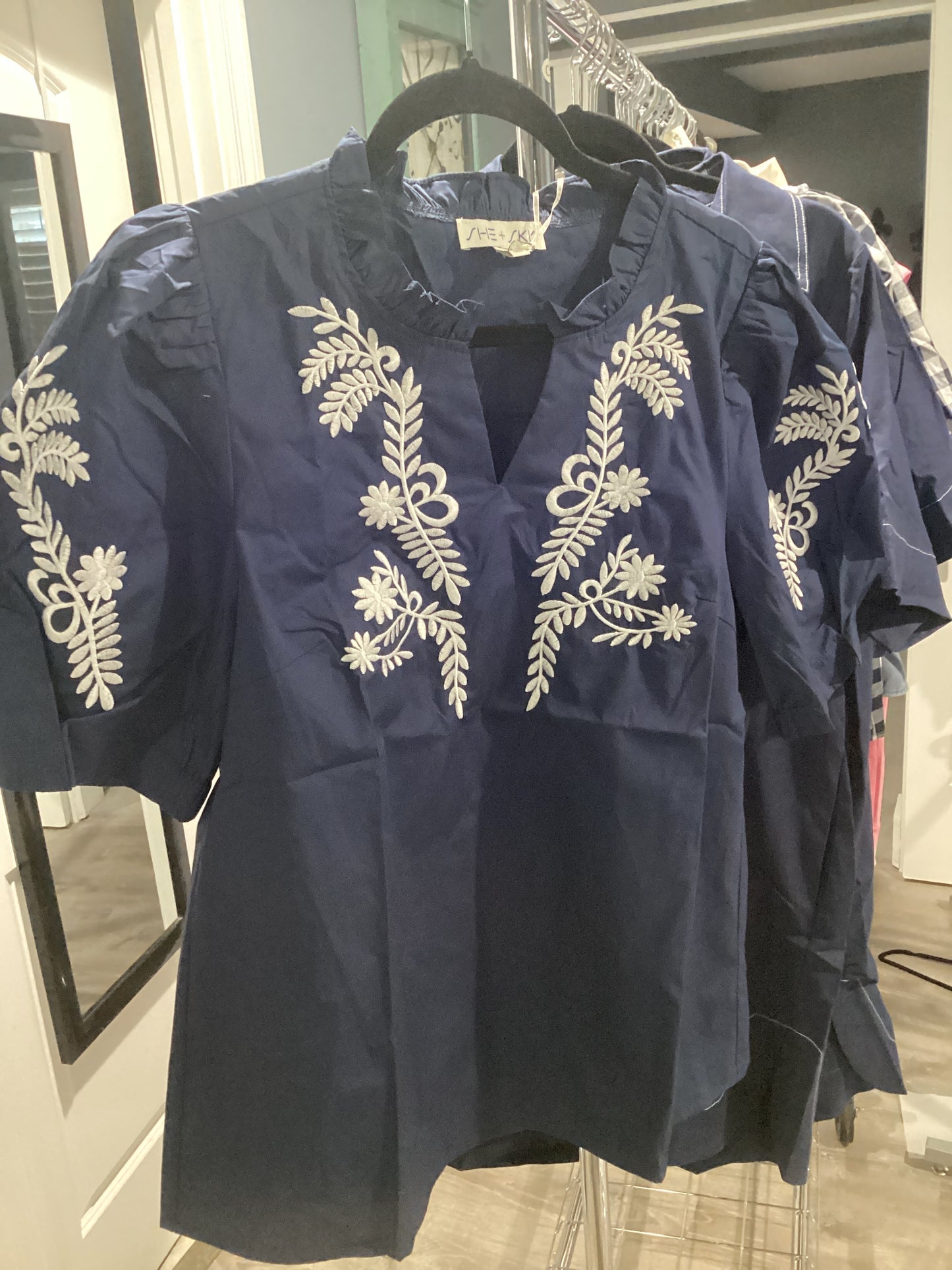 Navy blouse with embroidered sleeves