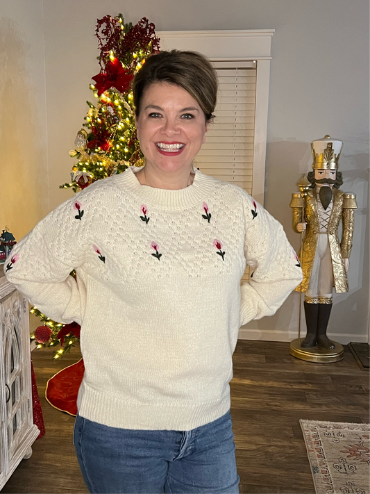 Sweater with floral appliqués