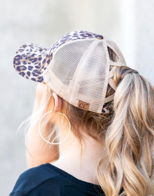 Criss cross suede leopard ponytail hat
