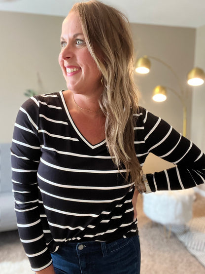 Striped v-neck dolphin hem top
