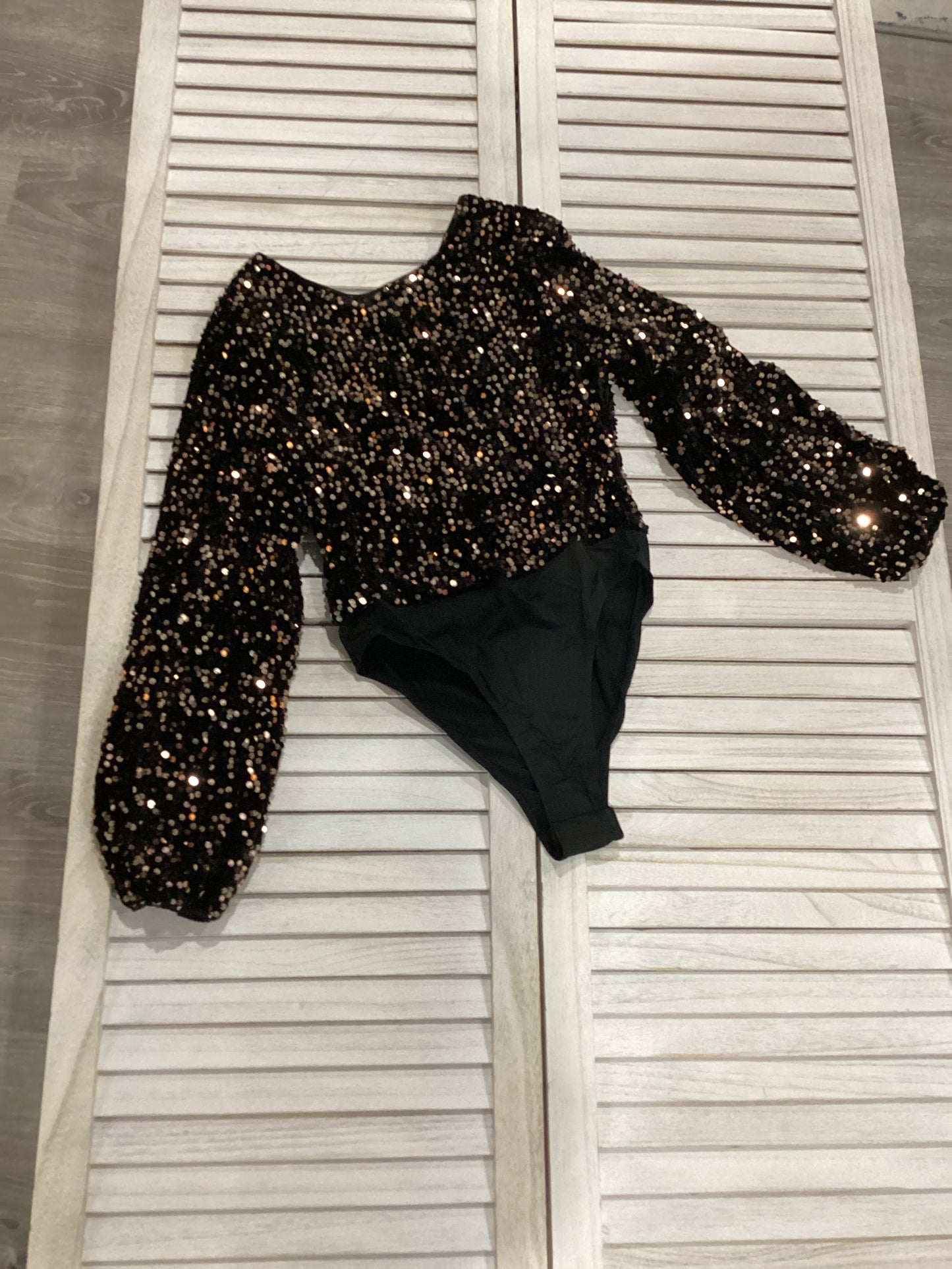 Black velvet bodysuit with gold sequins