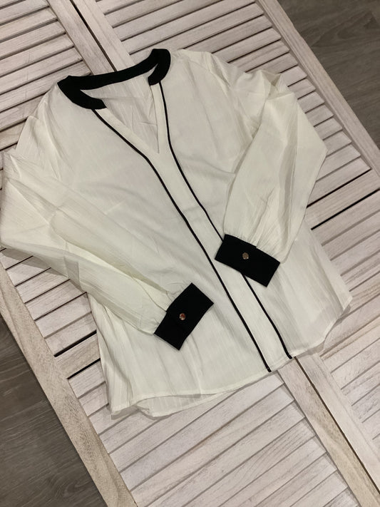 White blouse with black trim