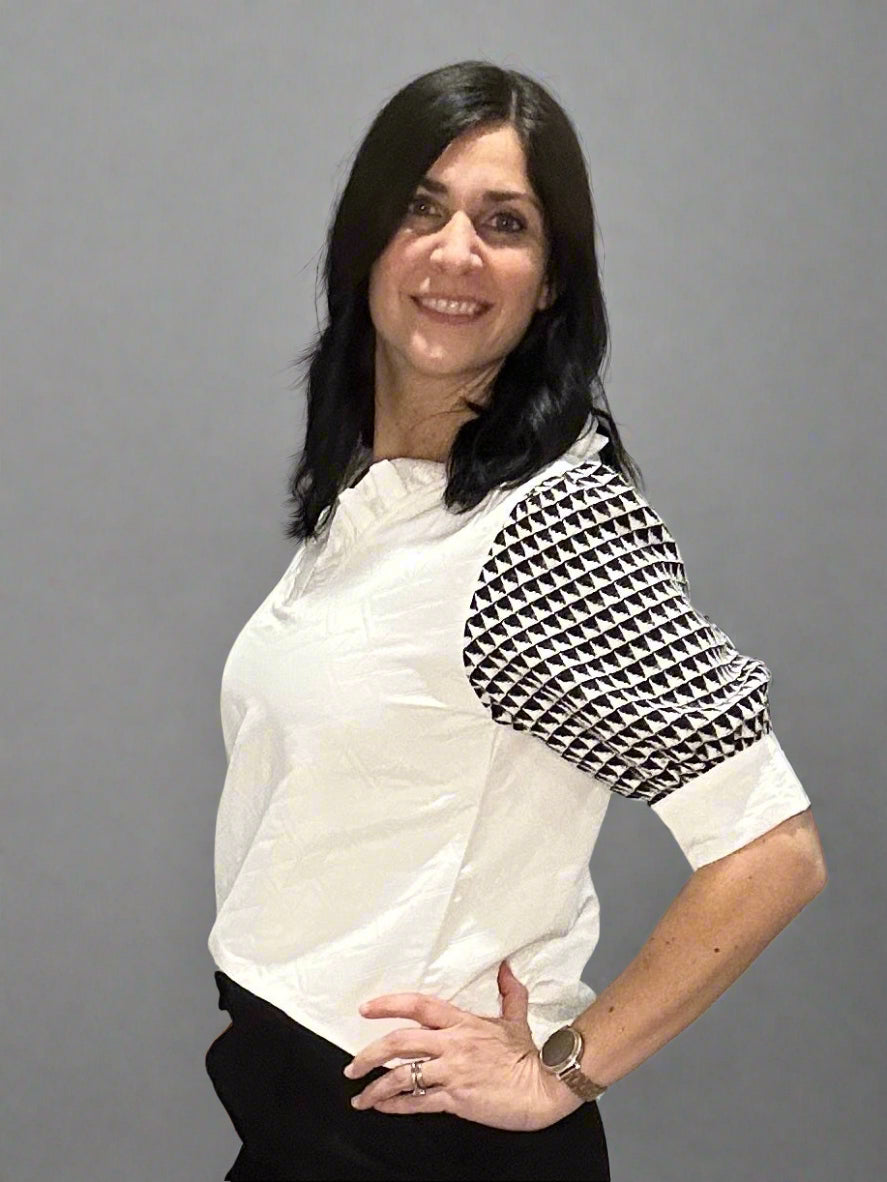 Geometric textured V-neck blouse